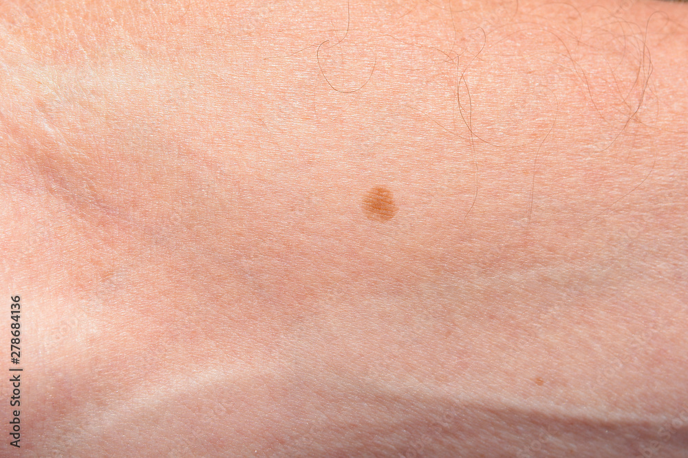 Fototapeta premium Male hand with age spots in retirement age