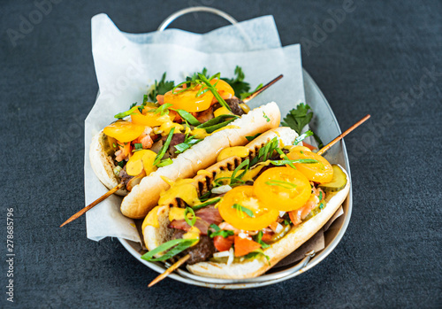 hot dogs with kebabs and vegetables