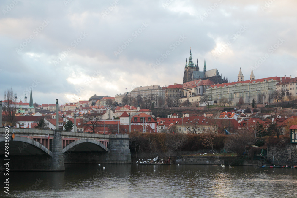 The panorama of the Charles bridge and Prazhsky Hrad in the center of Prague