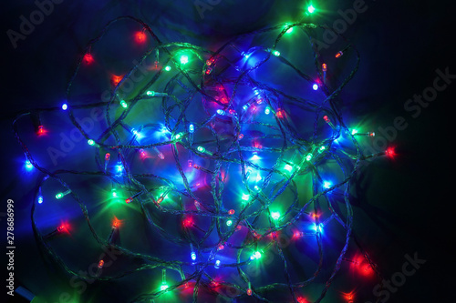 Christmas multicolor lights. Electric lights. Decorative garland