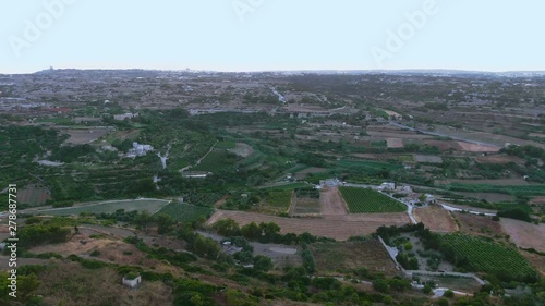 beautiful green fields of Buskette gardens near Verdala palace, Malta landscape, drone dolly in shot photo