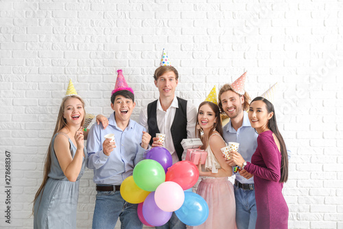 Group of friends celebratin...
