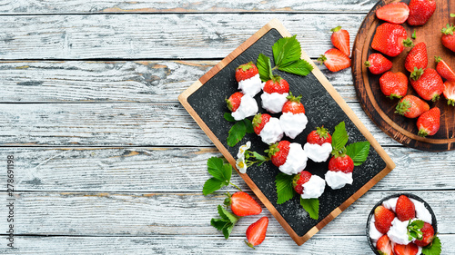 Strawberry with cream. Dessert. Berries Top view. Free space for your text.