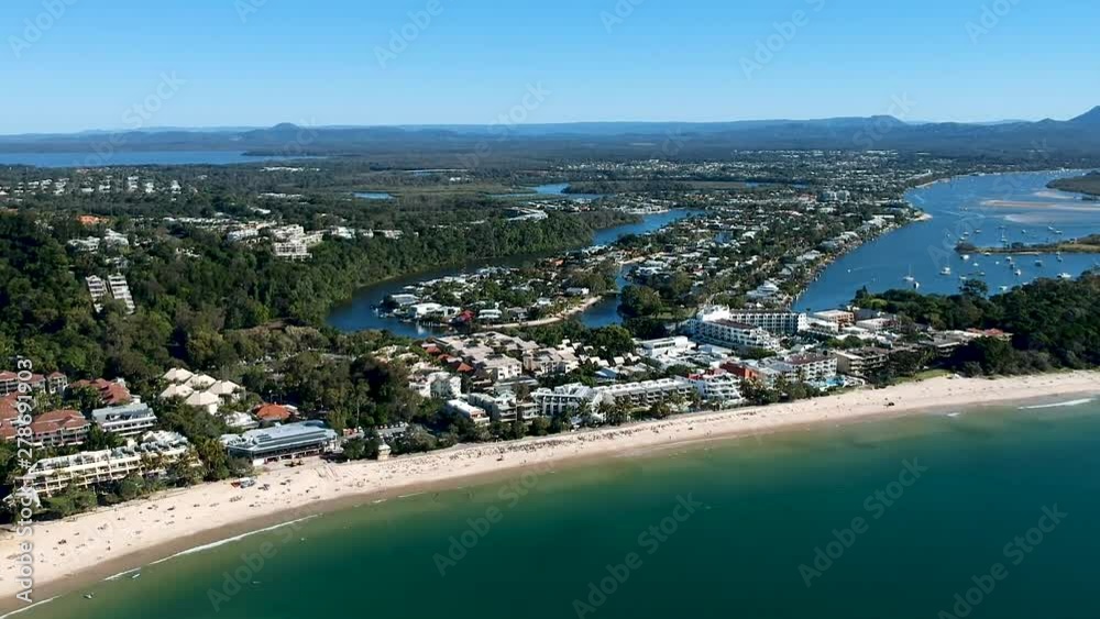 Wide aerial panning shot of Noosa main Beach, Noosa Heads, Queensland, Australia Wide aerial panning shot of Noosa main Beach, Noosa Heads, Queensland, Australia