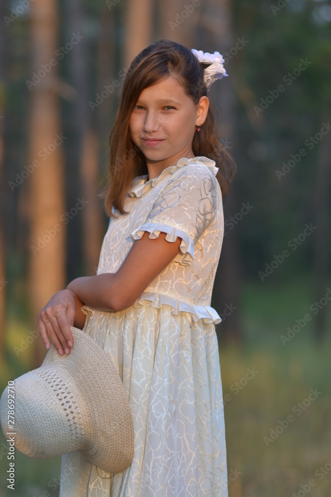 girl in the forest at sunset girl in the forest at sunset