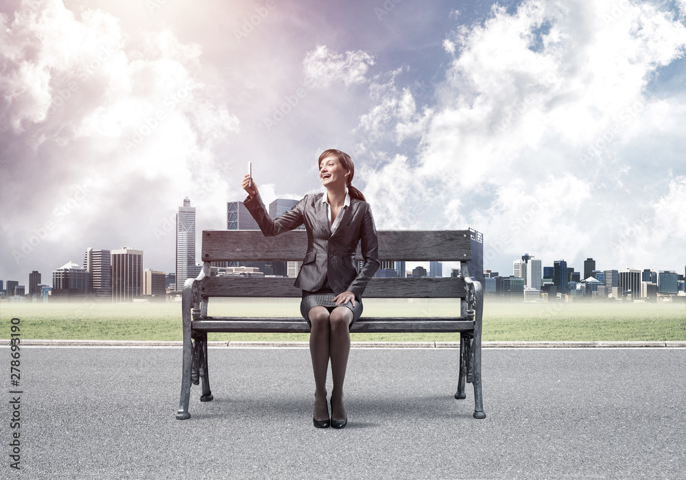 Business woman taking selfie photo or chatting