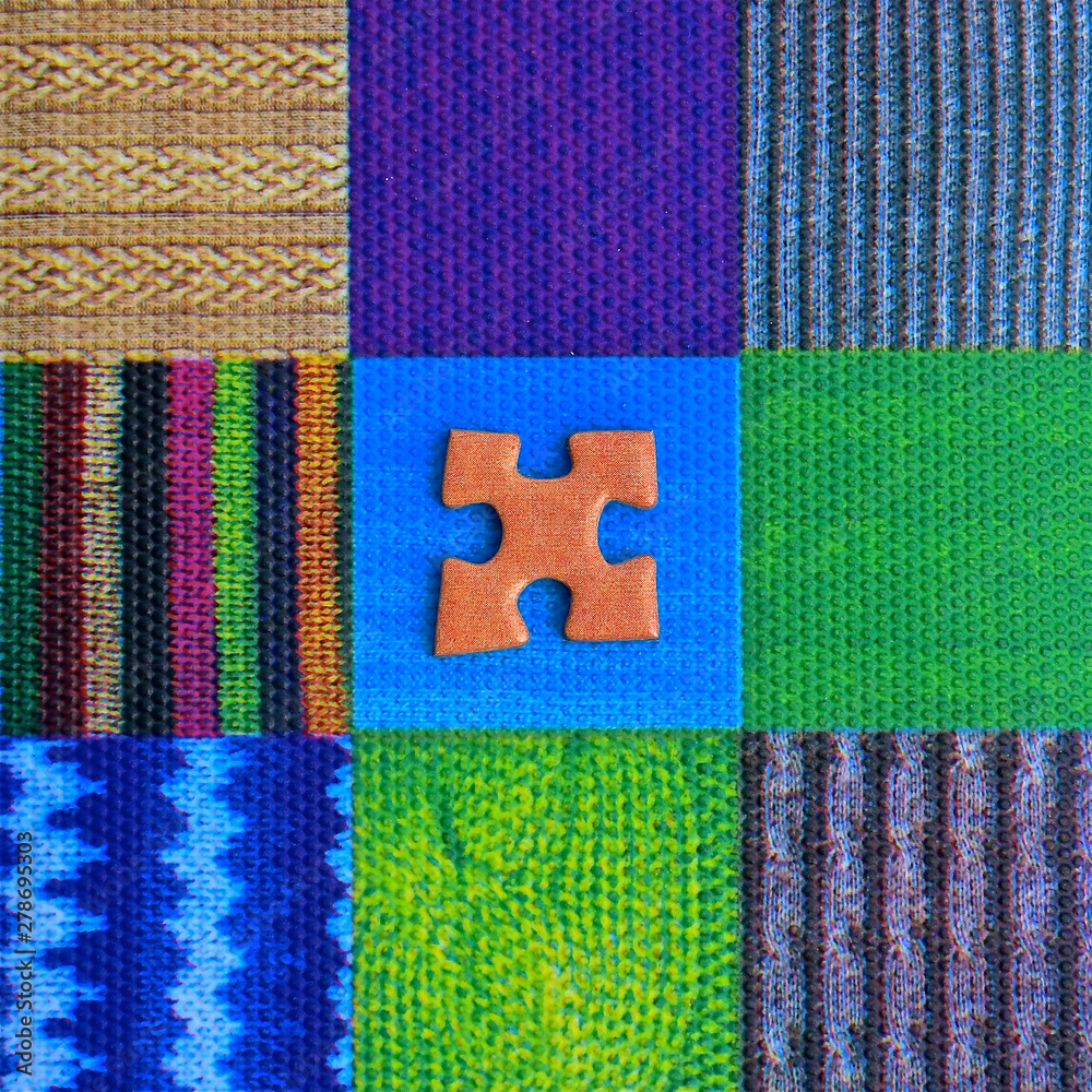 Jigsaw piece on a mosaic pattern