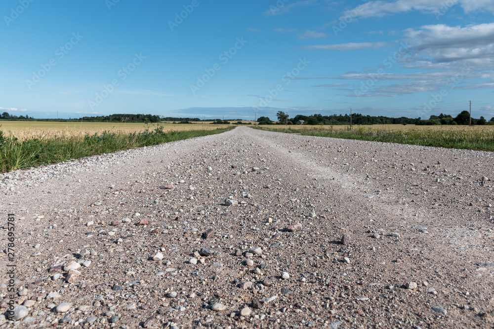 Gravel road in countryside of Latvia.