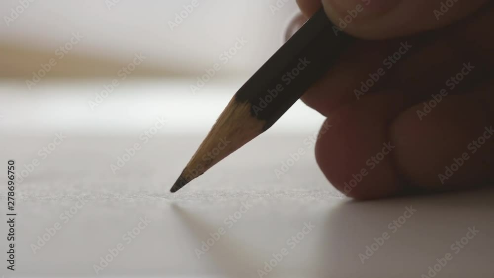 Close-up writing on a piece of paper. Writing love letters