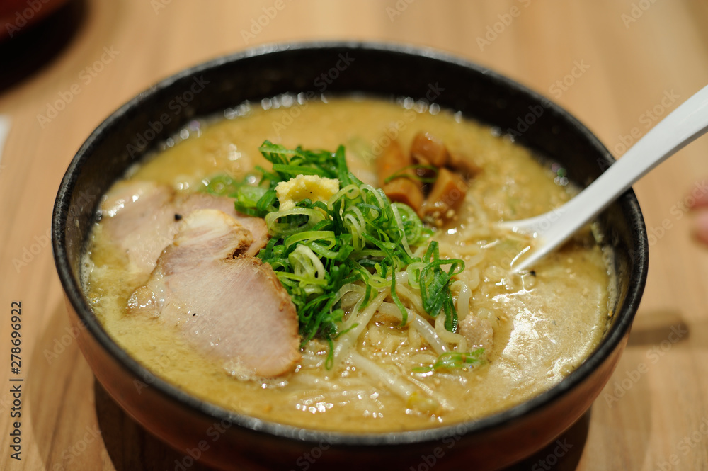 Traditional delicious ramen soup cooked with miso paste in Japan