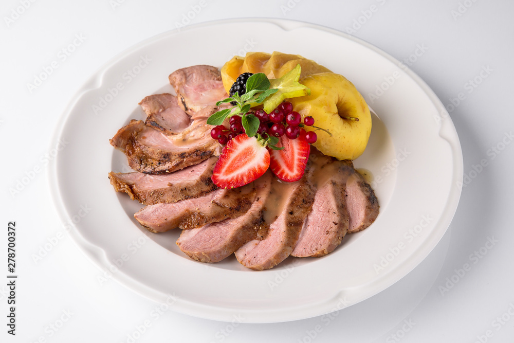 Slicing gourmet meat, pastrami, podcherevka, bastrum, beef and pork. Banquet festive dishes. Gourmet restaurant menu. White background. Slicing gourmet meat, pastrami, podcherevka, bastrum, beef and pork. Banquet festive dishes. Gourmet restaurant menu. White background.