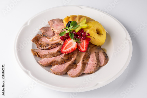 Slicing gourmet meat, pastrami, podcherevka, bastrum, beef and pork. Banquet festive dishes. Gourmet restaurant menu. White background.