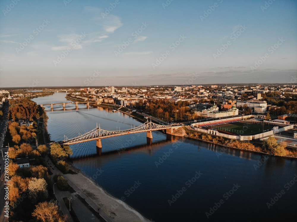 The old Volga bridge in Tver over the Volga at sunset. Top view