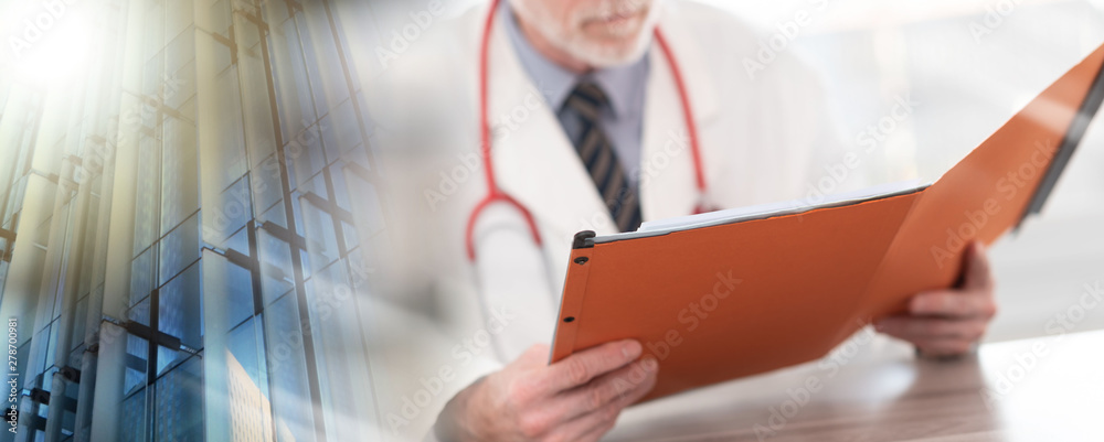 Doctor reading a medical report; multiple exposure Doctor reading a medical report; multiple exposure