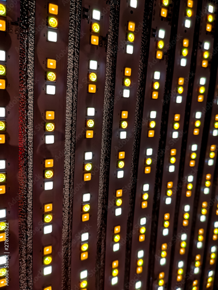 An abstract closeup of a RBG LED panel for lighting. Light for photography or video. An abstract closeup of a RBG LED panel for lighting. Light for photography or video.