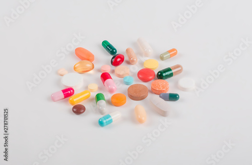 High number of pills on white background surface. High resolution image for pharmaceutical industry. 