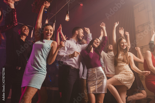 Low angle view photo of cute charming nice people person move motion close eyes raise hands delight positive pleasure content amusement formlawear formal wear indoors sepia photo