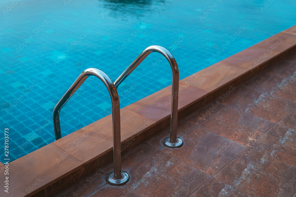 close up Swimming pool with stair with outdoor