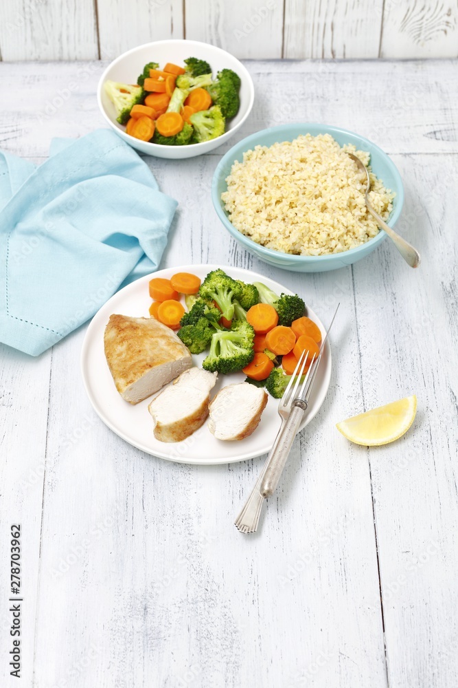 chicken breast with bulgur and steamed broccoli and carrot
