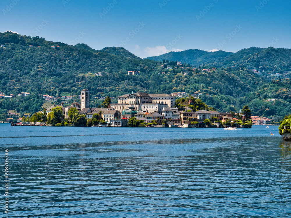 Island of San Giulio in Lake Orta Italy during a summer afternoon