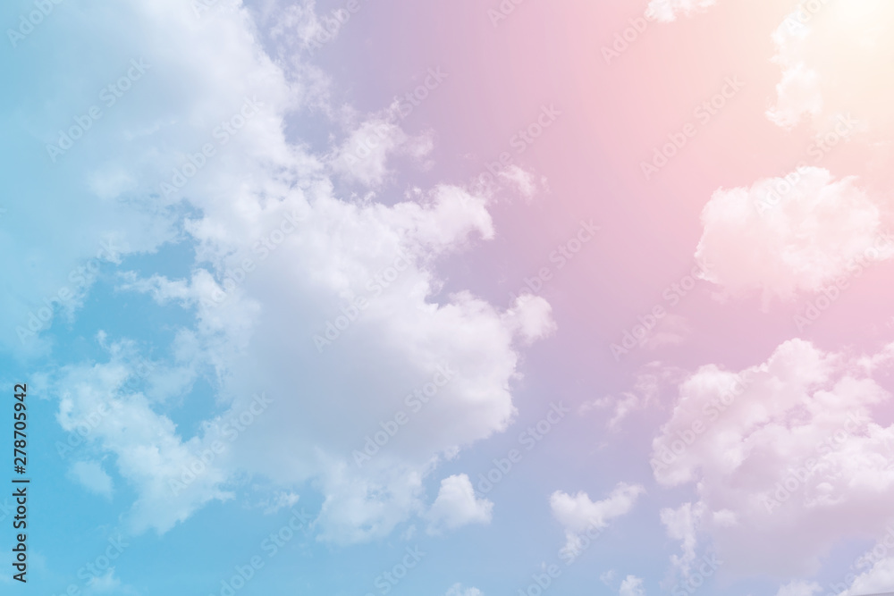 Cloud and sky with a pastel colored background.Fantasy magical sunny sky pastel background with colorful cloudy sky.