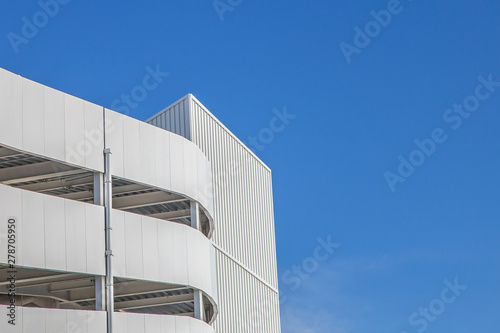 Modern building on a sunny day with a blue sky. 