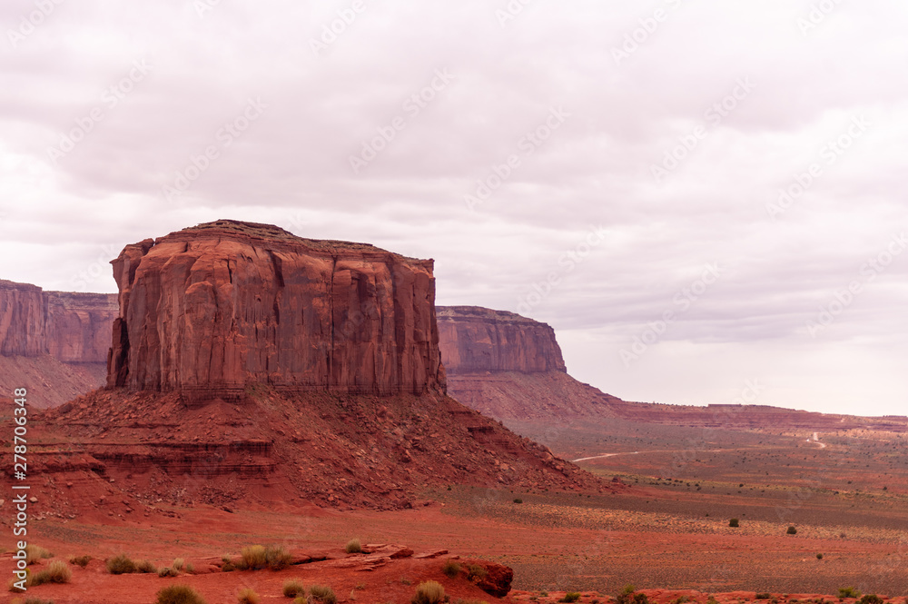 Monument Valley on a slightly overcast summer morning. Monument Valley on a slightly overcast summer morning.