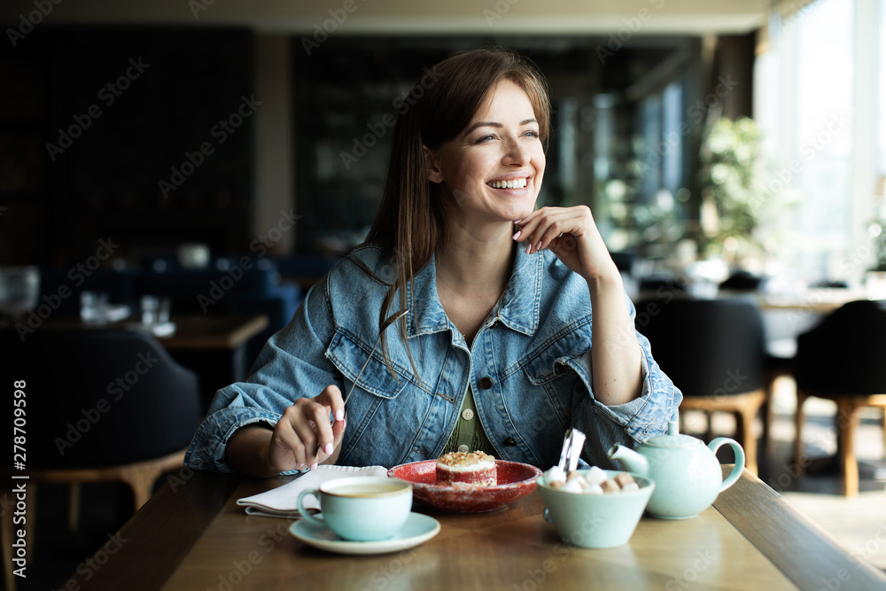 young girl drinking a tea with dessert young girl drinking a tea with dessert