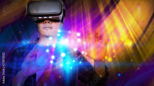 Young man wearing virtual reality glasses. VR glasses