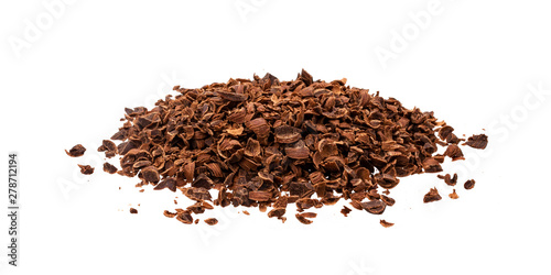 Grated chocolate. Pile of ground chocolate isolated on white background, closeup