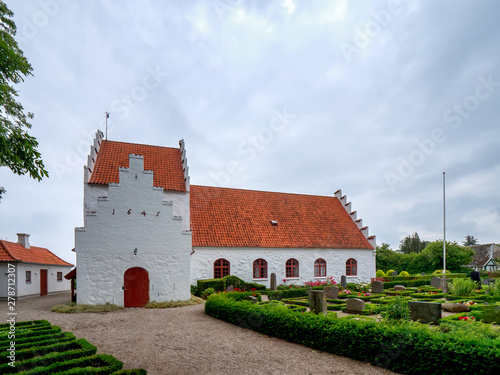 Tiny church on the small island Lyoe in Denmark photo