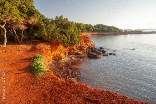 Santa Eularia des Riu, littoral, coastal, distinctive rocks ocher color. Mediterranean view, Ibiza island, Balearic Islands, Spain. photo