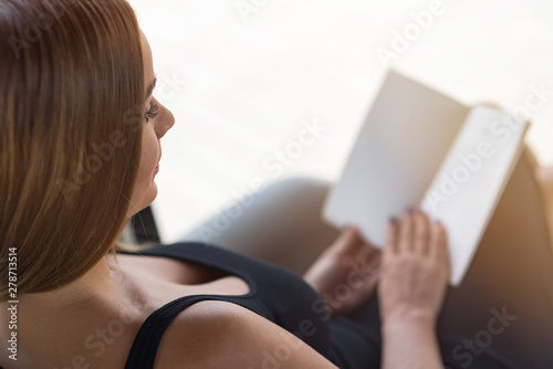 Dig into reading. Close up of businesswoman reading a book