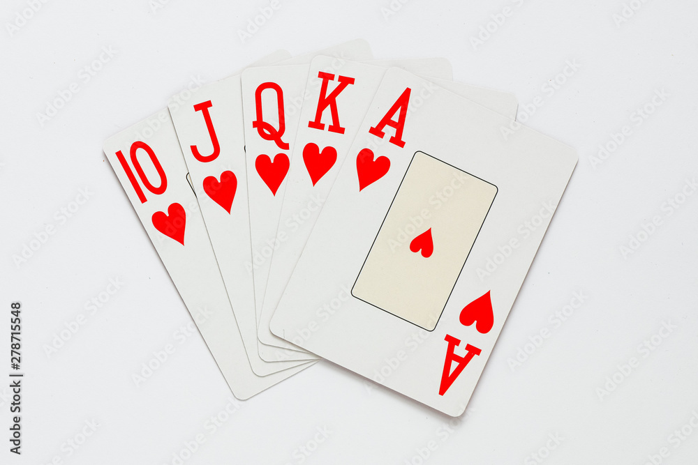 Obraz premium A royal straight flush playing cards poker hand in hearts.