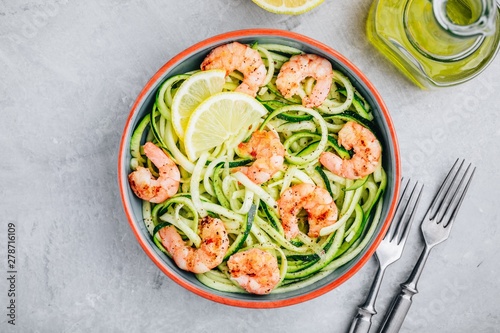 Spiralized zucchini noodles pasta with shrimps. Top view