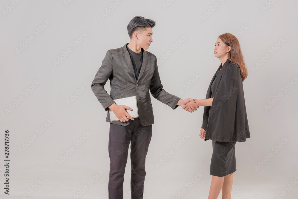 successful cooperation and confident partner concept, business people shake hands with customer.