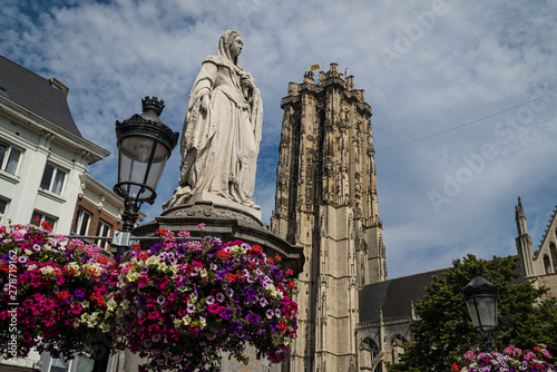 St Rumbold's Tower and statue, Mechelen, Belgium photo