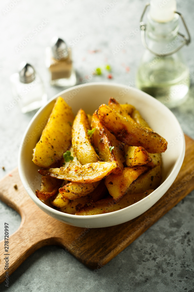 Roasted potato wedges with oregano Roasted potato wedges with oregano