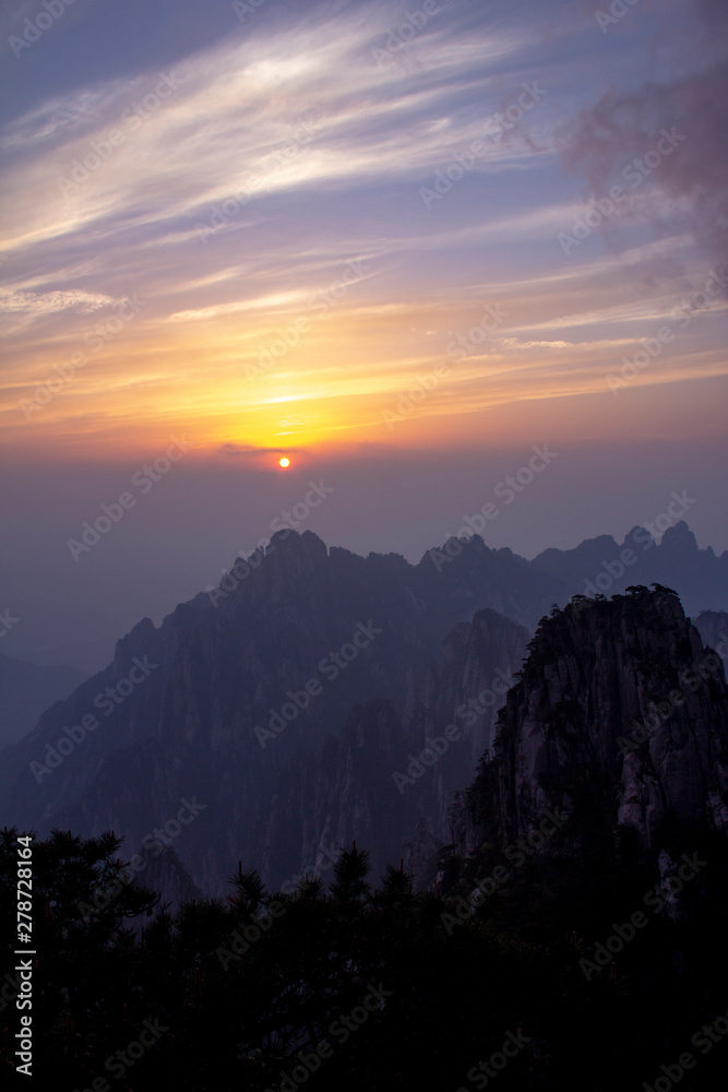 Naklejka premium Natural beautiful sunset view at Huangshan mountain scenery ( Yellow mountain ) in Anhui CHINA, It is a best of China major tourist destination. UNESCO World Heritage Site.