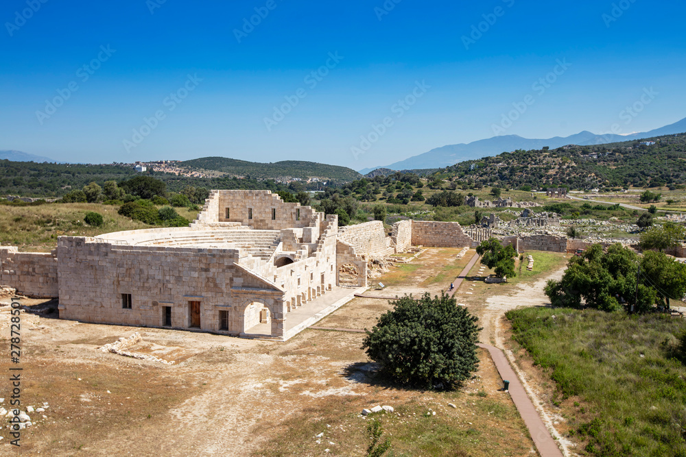 Patara (Pttra). Ruins of the ancient Lycian city Patara. Amphi-theatre and the assembly hall of Lycia public. Patara was at the Lycia (Lycian) League's capital. Aerial view shooting. Antalya, TURKEY