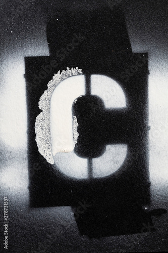 Letter C grunge spray paninted stencil font photo