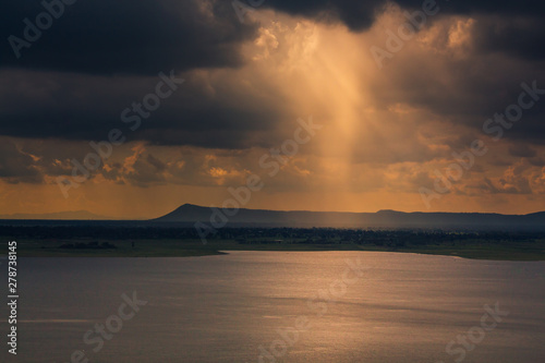  sunset reflection in a lake at Ubonrat dam photo