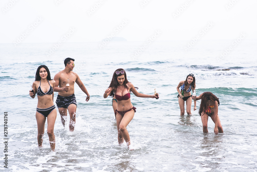 Summer vacation, Group of friends enjoy on the beach. Summer vacation, Group of friends enjoy on the beach.
