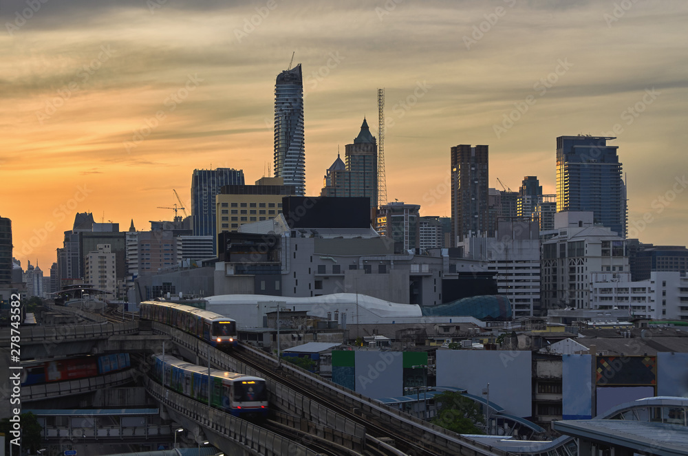 A BTS Skytrain pulls into a station in the bangkok