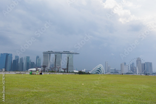 People watching the sunset and picnic at Marina Barrage