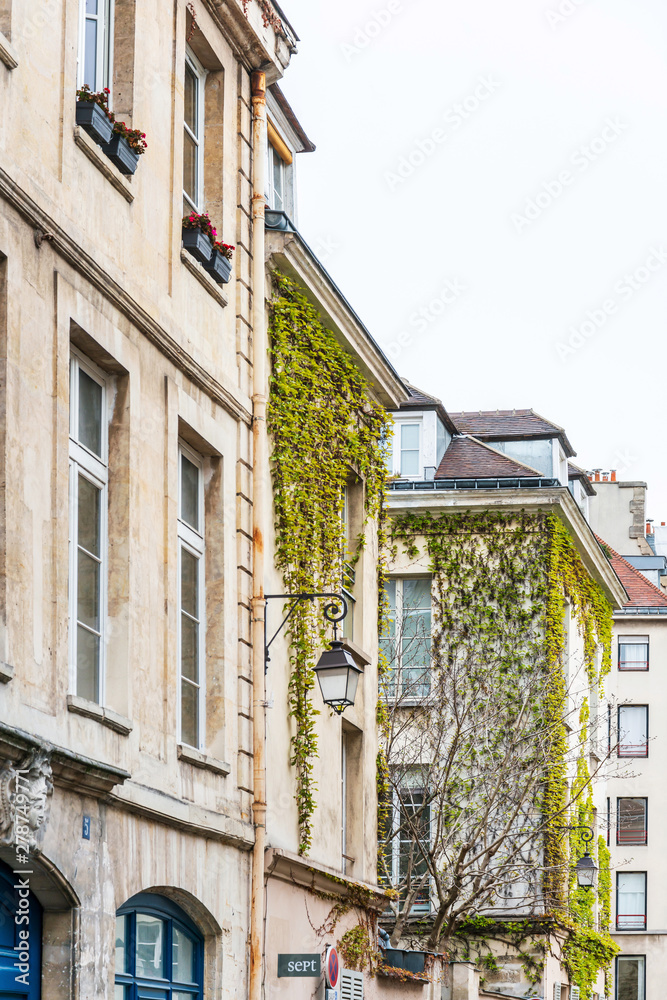 PARIS, FRANCE - APRIL 7, 2019: Antique building view in Paris city, France. PARIS, FRANCE - APRIL 7, 2019: Antique building view in Paris city, France.