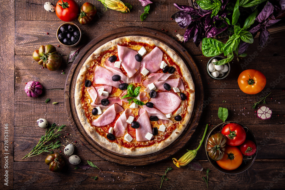Tasty hot italian pizza Queen with Bacon, Baked Pork, Tomatoes, Olives, Cheese, Feta, Mozzarella, Basil and Sauce on old wooden table. Pizzeria menu. Concept poster for Restaurants or pizze Tasty hot italian pizza Queen with Bacon, Baked Pork, Tomatoes, Olives, Cheese, Feta, Mozzarella, Basil and Sauce on old wooden table. Pizzeria menu. Concept poster for Restaurants or pizze