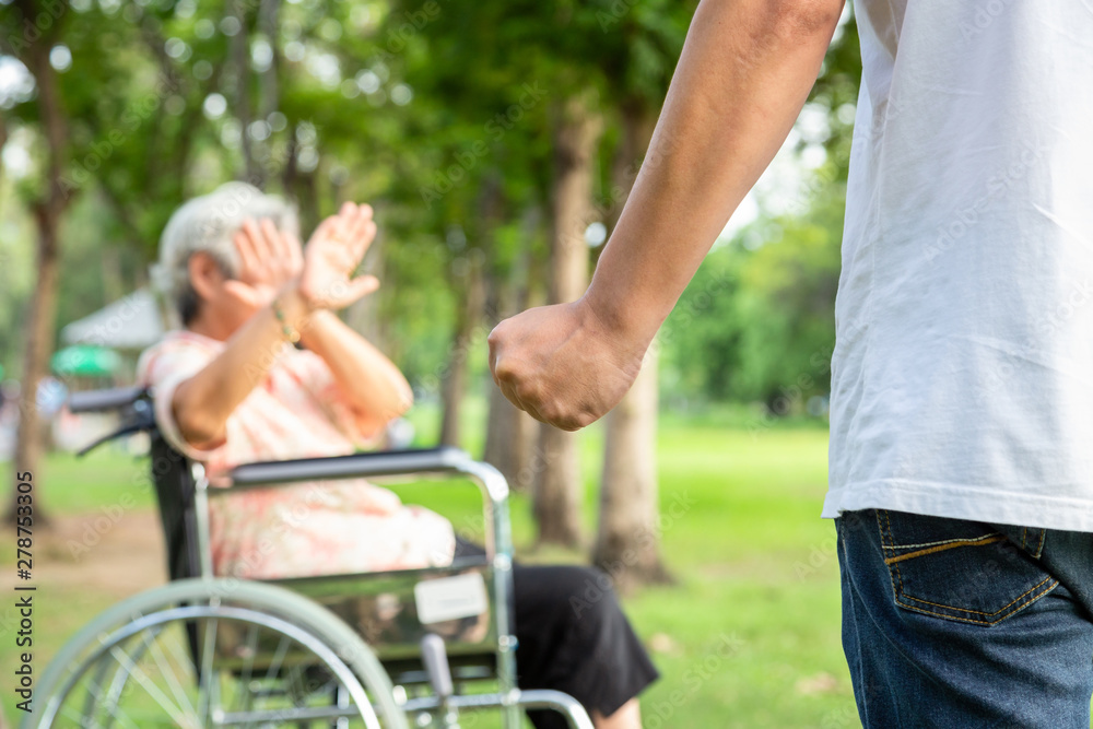 Asian elderly woman in wheelchair were physically abused,attacking in  outdoor,stop physical abuse senior people,angry man or caregiver raised  punishment fist,stop violence and aggression concept Stock-Foto | Adobe  Stock