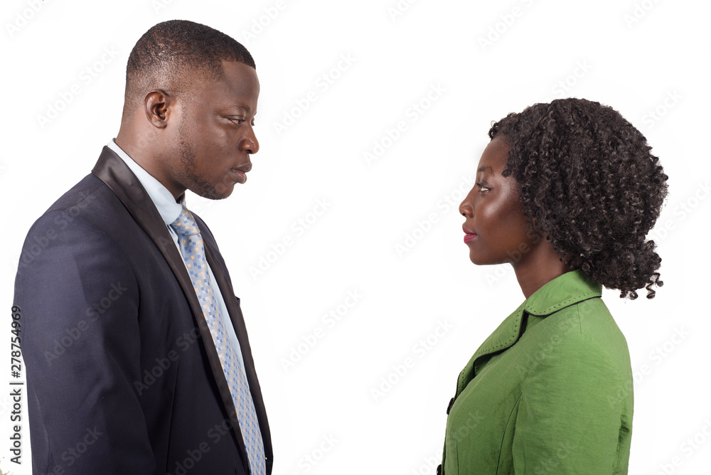 two office colleagues standing facing each other two office colleagues standing facing each other