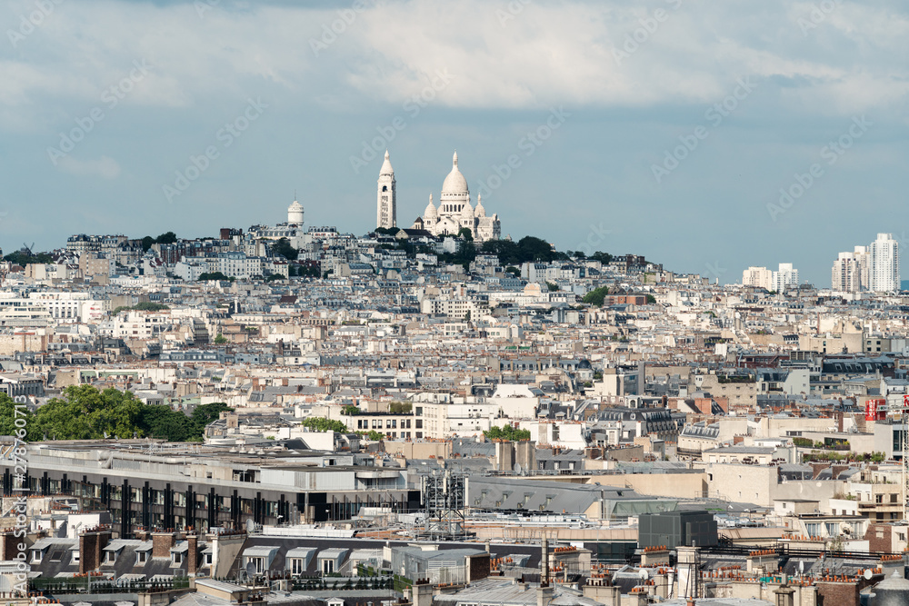 Landscape of Paris city in France with Sacré-Cœur, famous landmark and travel destination in Europe
